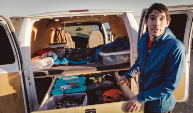 Alex Honnold checking his gear on his van.